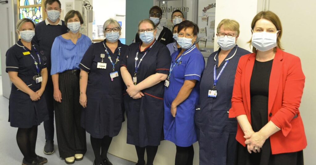 Amanda Hack with nurses at QMC