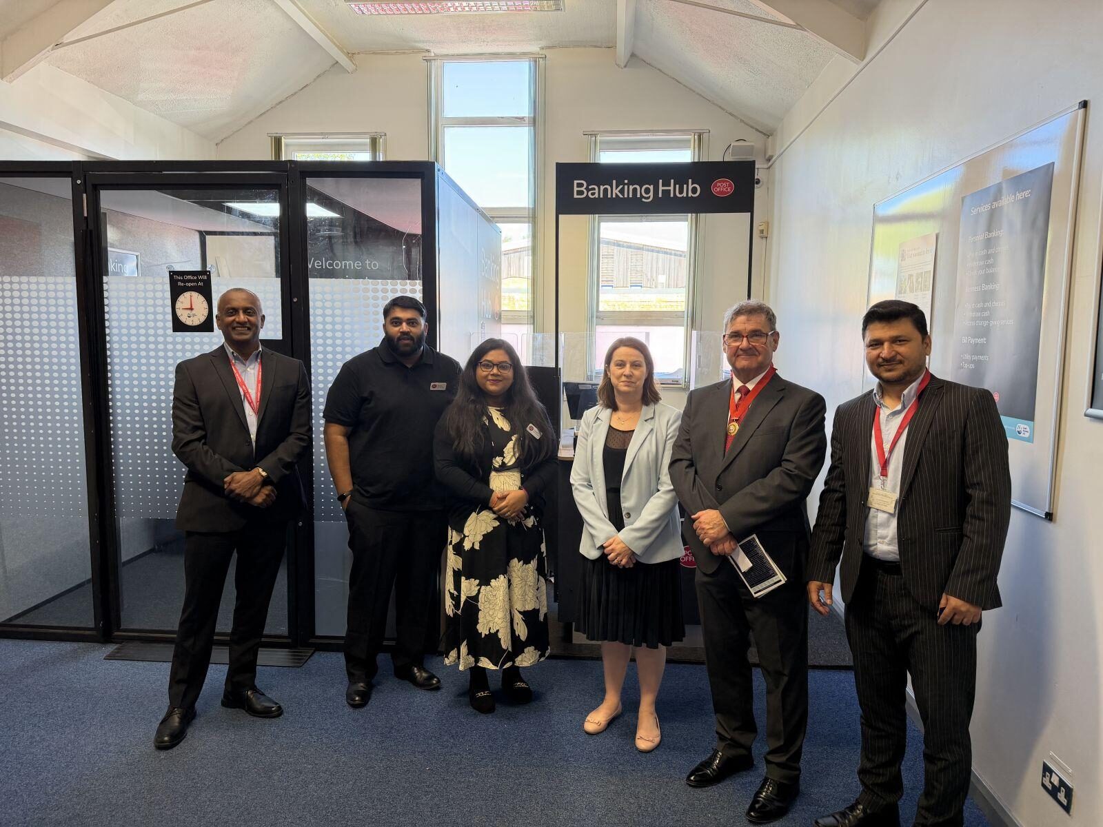 Amanda Hack MP and Deputy Town Mayor Cllr Murrae Blair-Park meeting Ashby Banking Hub staff